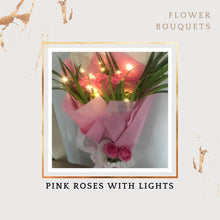 Load image into Gallery viewer, Floral blooms and flower blossoms delivery all over India Pink roses arranged with led string lights best birthday flower bouquet I-FBO
