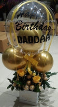 Load image into Gallery viewer, Yellow Balloon inside a transparent Balloon with text Happy Birthday 2 yellow balloons outside tied to a box of 16 Ferrero Rocher chocolates and roses adorned with yellow ribbons and led lights C-BFST

