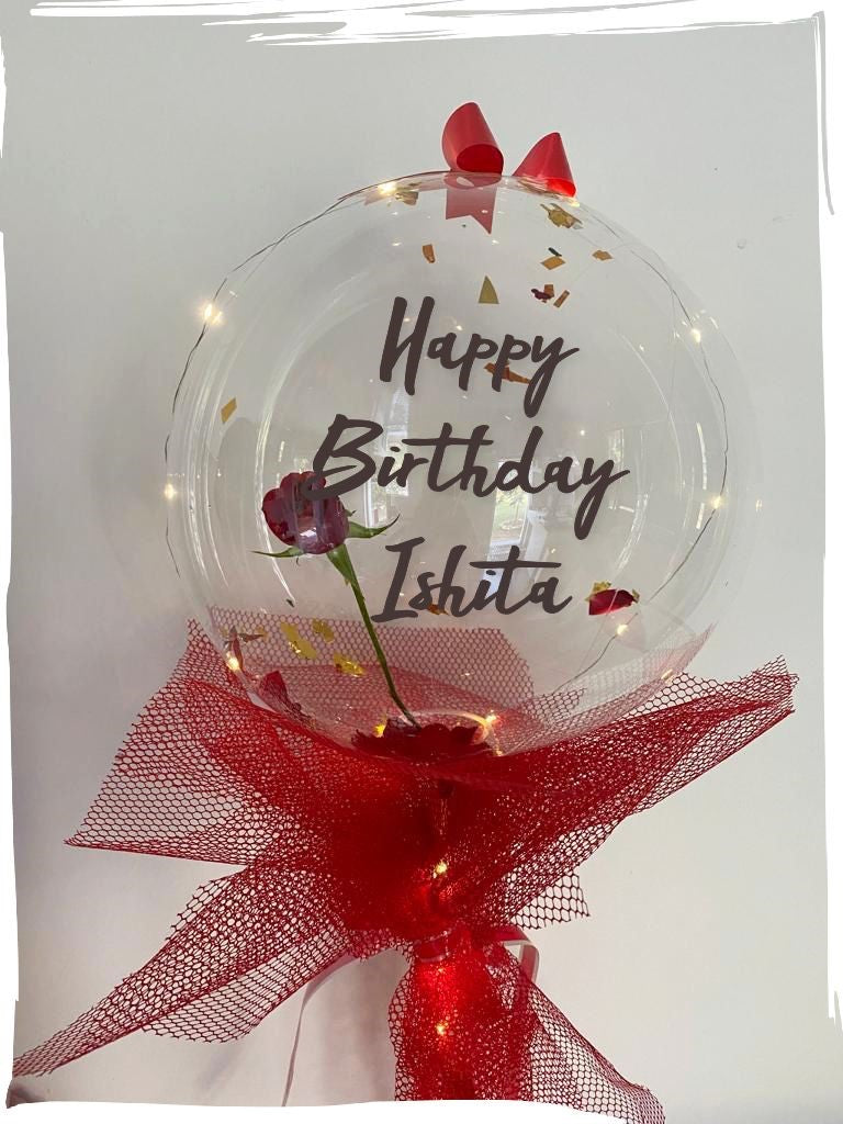 Rose inside a Clear bubble balloon with printed text Happy Birthday OR Happy Anniversary OR Congratulations C-BFST
